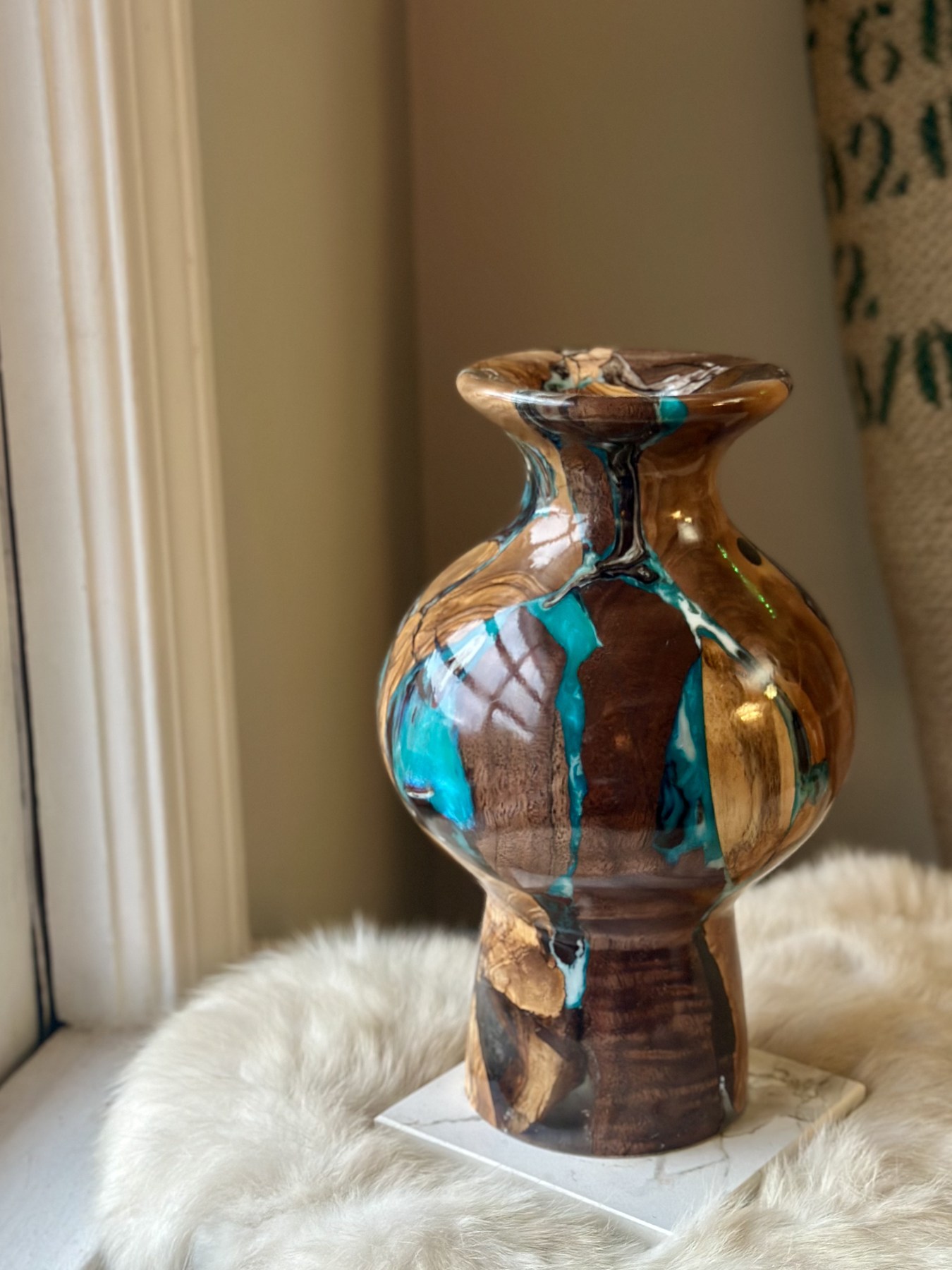 Final wood and resin sculptural form created from the client's proposed design